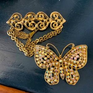 Pair of gold costume jewelry pins